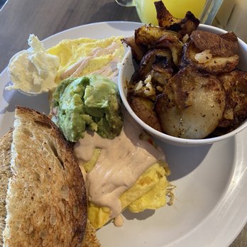 Daily Eats - Omelet with sourdough toast and breakfast potatoes. Also had coffee and a mimosa - New American Near Me - Tampa, Florida Daily Eats - Omelet with sourdough toast and breakfast potatoes. Also had coffee and a mimosa - New American Near Me - Tampa, Florida