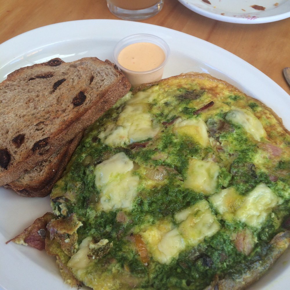 Sun Street Breads - Frittata special with ham, cheese, herbs and srichacha mayo- served with choice of bread- mine was with figgy rye - Bakeries Near Me - Minneapolis, Minnesota Sun Street Breads - Frittata special with ham, cheese, herbs and srichacha mayo- served with choice of bread- mine was with figgy rye - Bakeries Near Me - Minneapolis, Minnesota