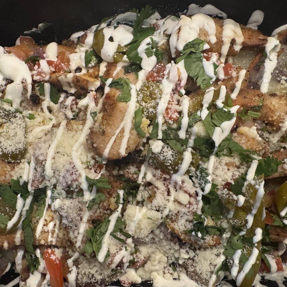 Rosa Mexicano - Rosas Signature Nachos. - Mexican Near Me - Oxon Hill, Maryland Rosa Mexicano - Rosas Signature Nachos. - Mexican Near Me - Oxon Hill, Maryland