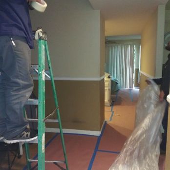Adans Plumbing - Putting up plastic curtains to minimize dust in a whole house Repipe - Plumbing Near Me