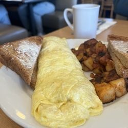 The Lighthouse Restaurant - Homemade Corned Beef Hash omelet