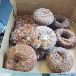 Donut Stop - Damaged donuts just received at drive up window. Donut Shop should be embarrassed.