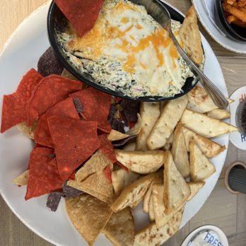 Montana's BBQ & Bar - Four cheese dip - Comfort Food Near Me - London, Ontario Montana's BBQ & Bar - Four cheese dip - Comfort Food Near Me - London, Ontario