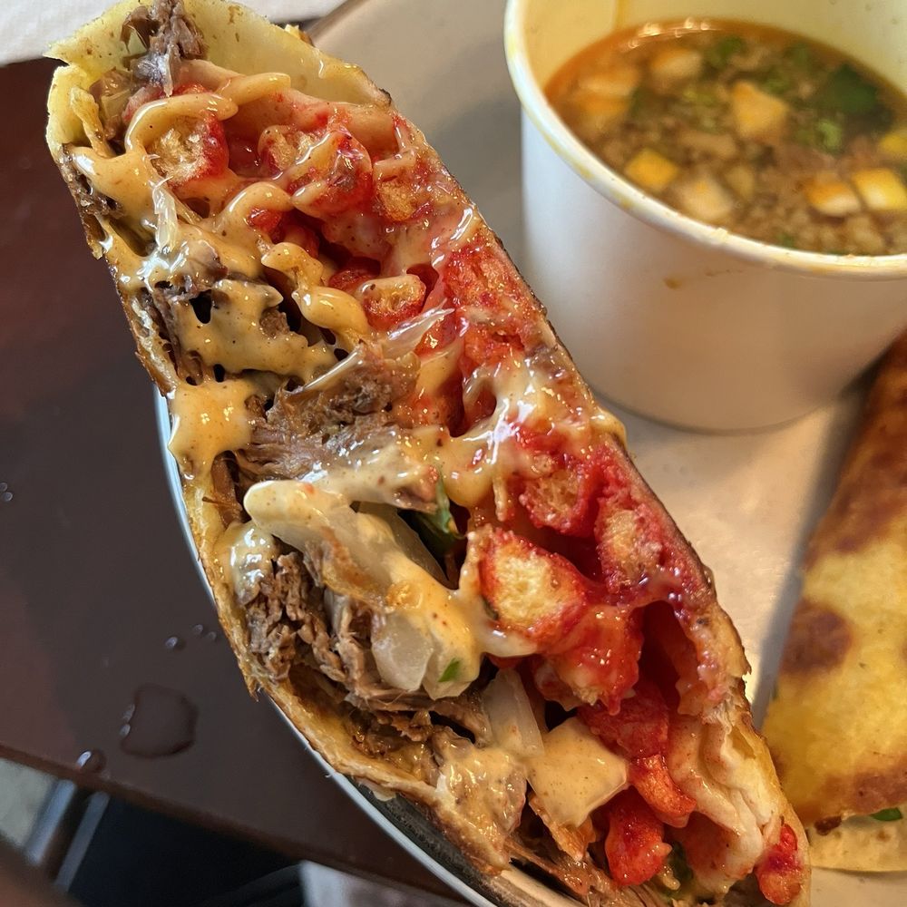 The Spot - Supreme Crunchwrap with steak - Tacos Near Me - Detroit, Michigan The Spot - Supreme Crunchwrap with steak - Tacos Near Me - Detroit, Michigan