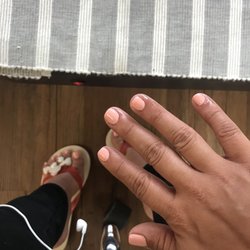 Blooming Nails - I've been here twice.They're so personable here and are always willing to do their best to accommodate you. I paid $41.
