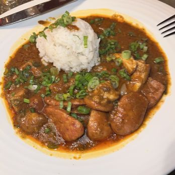 Laveau - Chicken & Sausage étouffée - Cajun/Creole Near Me - Cincinnati, Ohio Laveau - Chicken & Sausage étouffée - Cajun/Creole Near Me - Cincinnati, Ohio