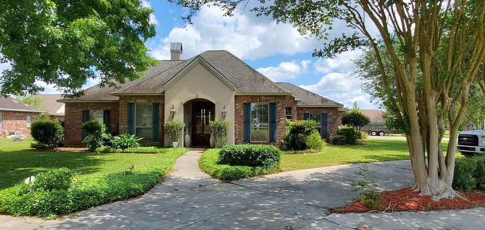 Slide of Pelican Roofing