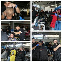 Clippers Barber Shop - Cutting hair for the homeless and family's in need.  At the He GOT UP event.