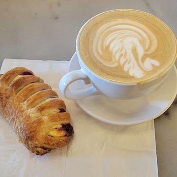 Le Cafe Du Val - Coconut Latte with a cherry pastry - Cafes Near Me - Henderson, Nevada Le Cafe Du Val - Coconut Latte with a cherry pastry - Cafes Near Me - Henderson, Nevada