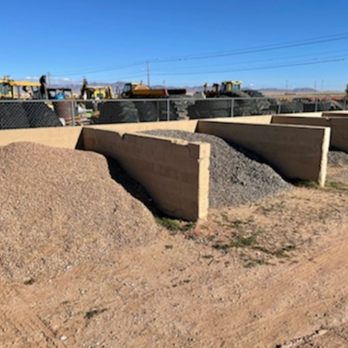 Charlotte's Landscape Supply - a pile of gravel next to a construction site - Landscaping Near Me - Kingman, Arizona Charlotte's Landscape Supply - a pile of gravel next to a construction site - Landscaping Near Me - Kingman, Arizona