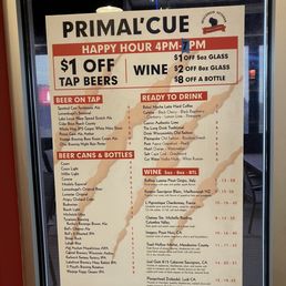 Drink menu on the door to the patio seating Drink menu on the door to the patio seating