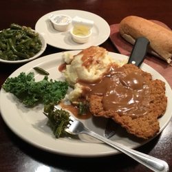 Michael's Casual Dining - Chicken fried steak (I opted for brown gravy), mashed, green beans, and warm bread w/ honey butter.