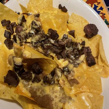 Cafe Ole - We ordered the nachos with spicy beef. It came with cheese sauce, not spicy beef, and refried beans. That's it. - Mexican Near Me - San Antonio, Texas Cafe Ole - We ordered the nachos with spicy beef. It came with cheese sauce, not spicy beef, and refried beans. That's it. - Mexican Near Me - San Antonio, Texas