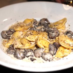 Pasta Pasta - Tortellino Stuffed with Six Cheeses - topped with roasted crimini mushrooms in a Chardonnay cream sauce. Requested without lobster.