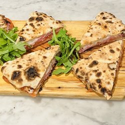 Liola - FOCACCIA- Tomato, prosciutto cotto, mozzarella sandwich.