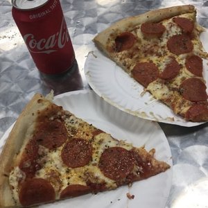 Photo of 2 Bros Pizza - New York, NY, United States. Simple pepperoni pizza in nyc at st marks place. cheap, easy, and quick. For when your in a rush.