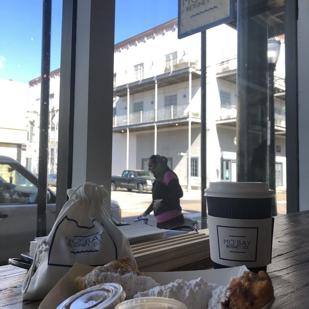 Mo'Bay Beignet - 3 piece Beignet with cinnamon and buttercream syrup! - Coffee & Tea Near Me - Mobile, Alabama Mo'Bay Beignet - 3 piece Beignet with cinnamon and buttercream syrup! - Coffee & Tea Near Me - Mobile, Alabama