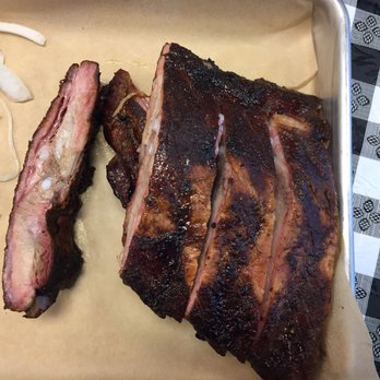 Smokin Barrel BBQ - Beautiful spare ribs with rib tips left on the end. - Barbeque Near Me - Omaha, Nebraska