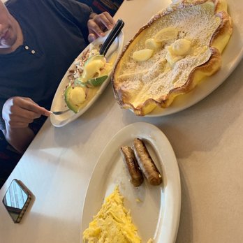 Elmer's Restaurant - German pancake with lemon and butter, eggs and chicken sausage. Avocado eggs Benedict with hash browns - Diners Near Me - Salem, Oregon Elmer's Restaurant - German pancake with lemon and butter, eggs and chicken sausage. Avocado eggs Benedict with hash browns - Diners Near Me - Salem, Oregon