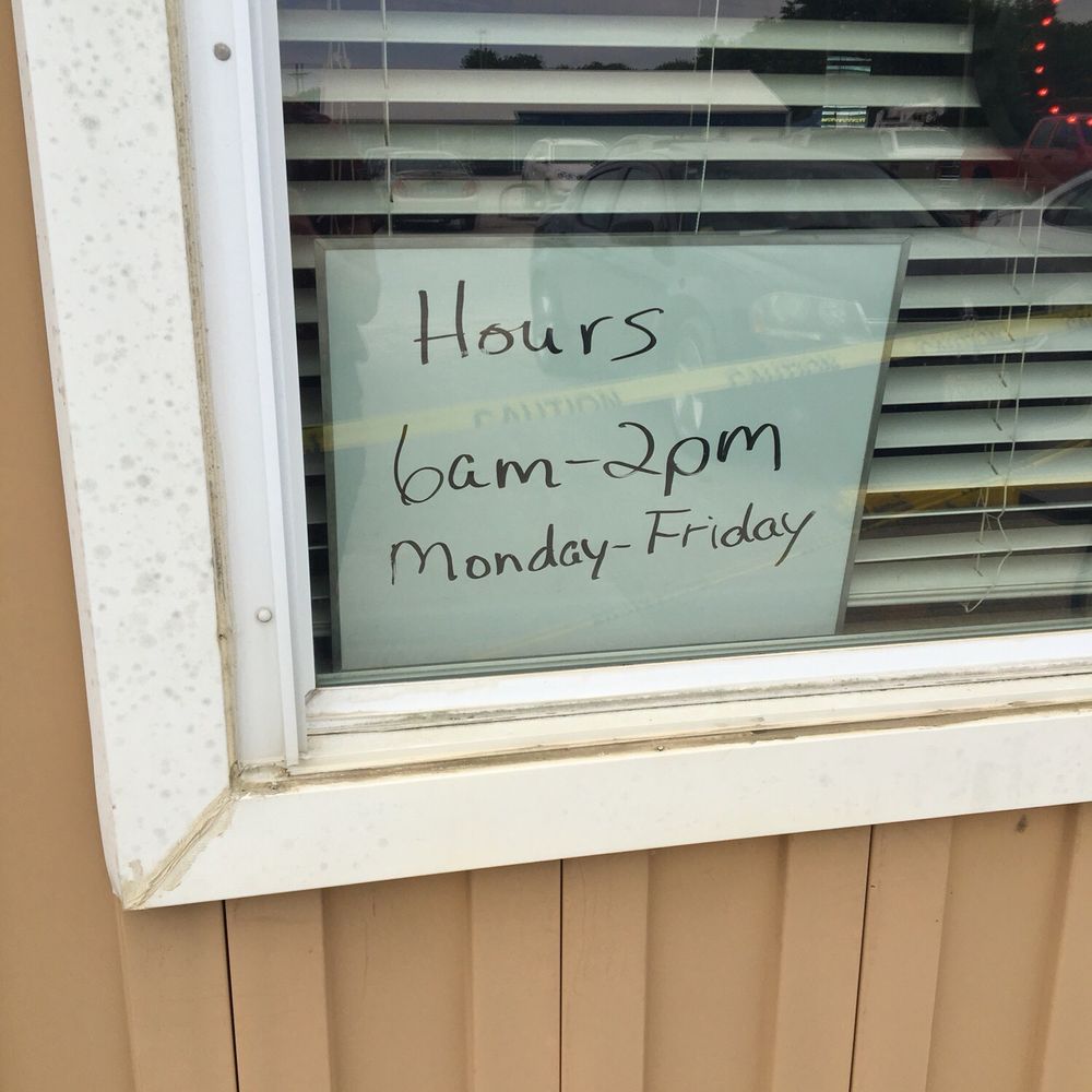 a sign in the window of a restaurant