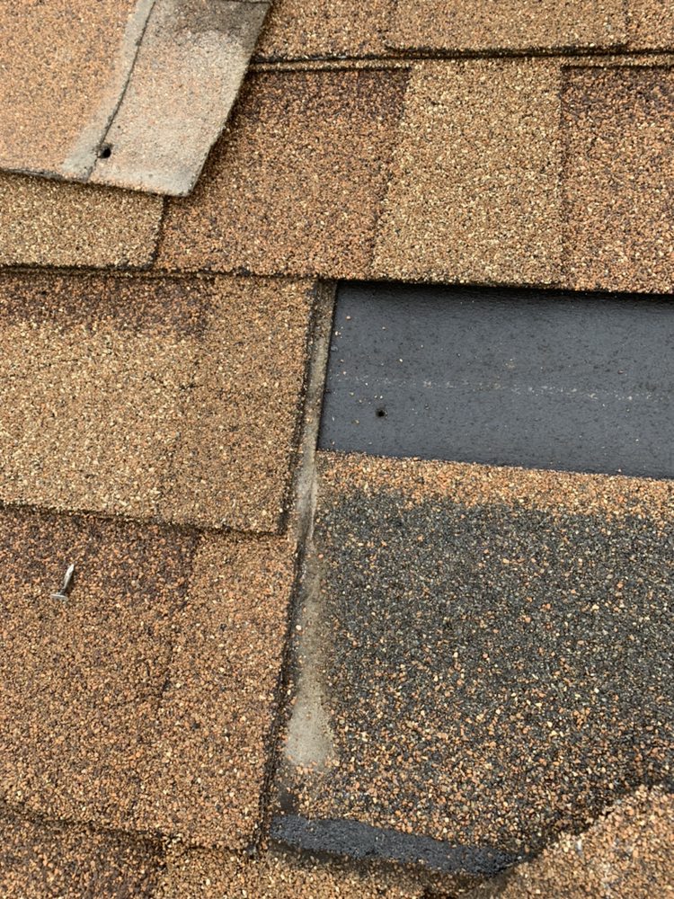 Slide of Century Roofing Company