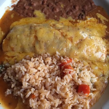 Rancheros Mexican Restaurant - Beef enchilada. Other half of Refugio's - Mexican Near Me - Magnolia, Texas Rancheros Mexican Restaurant - Beef enchilada. Other half of Refugio's - Mexican Near Me - Magnolia, Texas