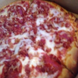 Pepperoni and bacon pizza. Pepperoni and bacon pizza.