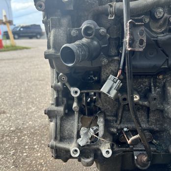 Hoover & Sons Auto Repair - Blown engine, AC compressor area. - Auto Repair Near Me - Flint, Michigan