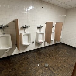 Gearjammer Truck Plaza - Filthy men's toilet at Gearjammer.