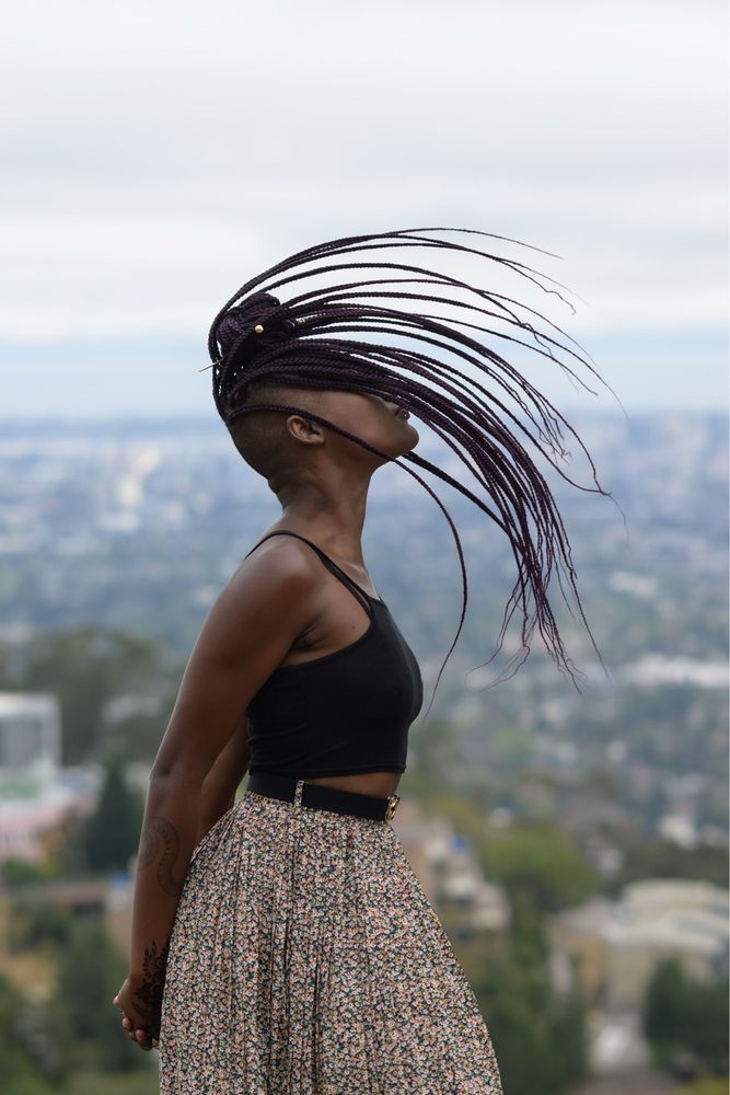 Adom Hair Braiding Logo