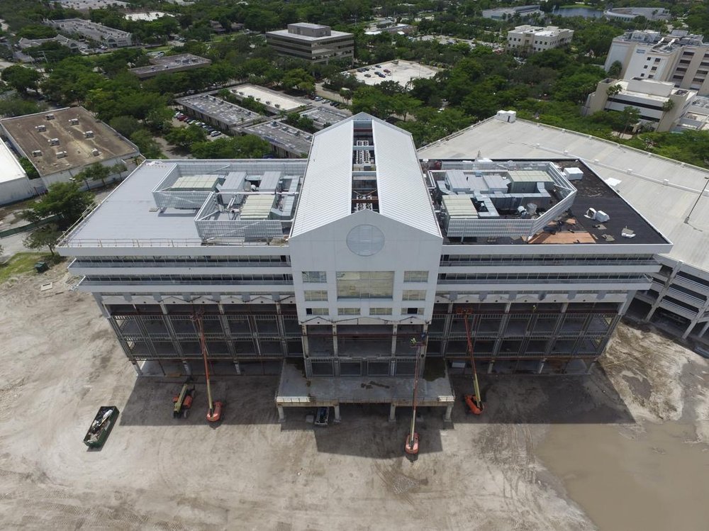 Slide of CSC South Florida Roofing and Asphalt Experts