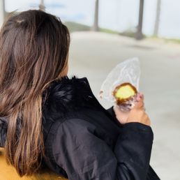 Enjoying her candy apple Enjoying her candy apple