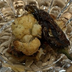 Cork + Table - Shishito pepper over charred cauliflower and some picado sauce!