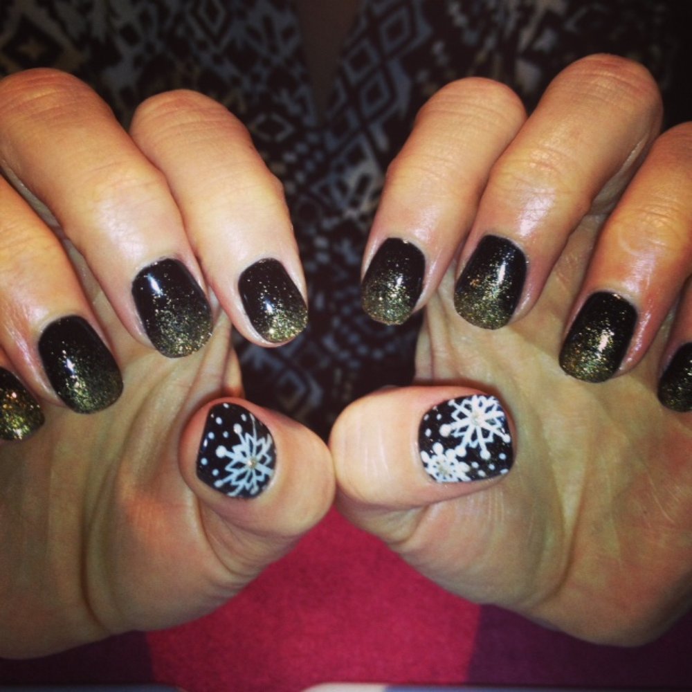 Gel hand painted snowflake nails done by Melissa Glen Gel hand painted snowflake nails done by Melissa Glen