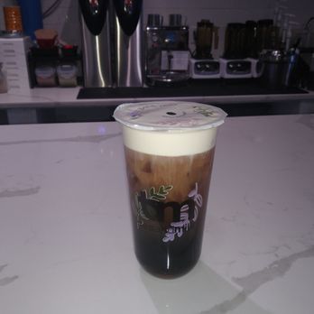 Tea and Milk - Brown sugar oolong tea with added tapioca (before the shake up) - Bubble Tea Near Me - Brooklyn, New York Tea and Milk - Brown sugar oolong tea with added tapioca (before the shake up) - Bubble Tea Near Me - Brooklyn, New York