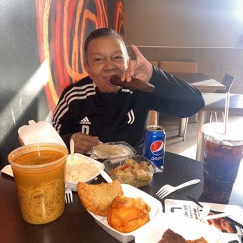 La Lechonera Restaurant - Food from la lechonera being eaten in McDonalds. - Latin American Near Me - Roslindale, Massachusetts La Lechonera Restaurant - Food from la lechonera being eaten in McDonalds. - Latin American Near Me - Roslindale, Massachusetts
