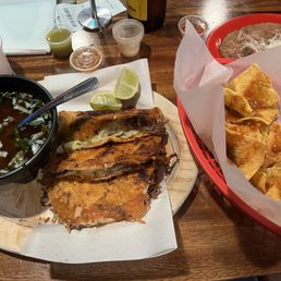 Quesabirria special, chips and salsa plus side of beans Quesabirria special, chips and salsa plus side of beans