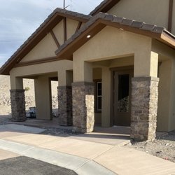 Superman Stone and Tile - Exterior stone residential home