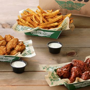Wingstop - three baskets of chicken wings and two dipping sauces - Chicken Wings Near Me - Annandale, Virginia