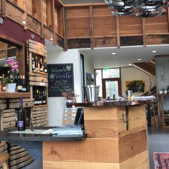 Viento Winery - a wine shop with wine bottles on shelves - Wineries Near Me - Hood River, Oregon