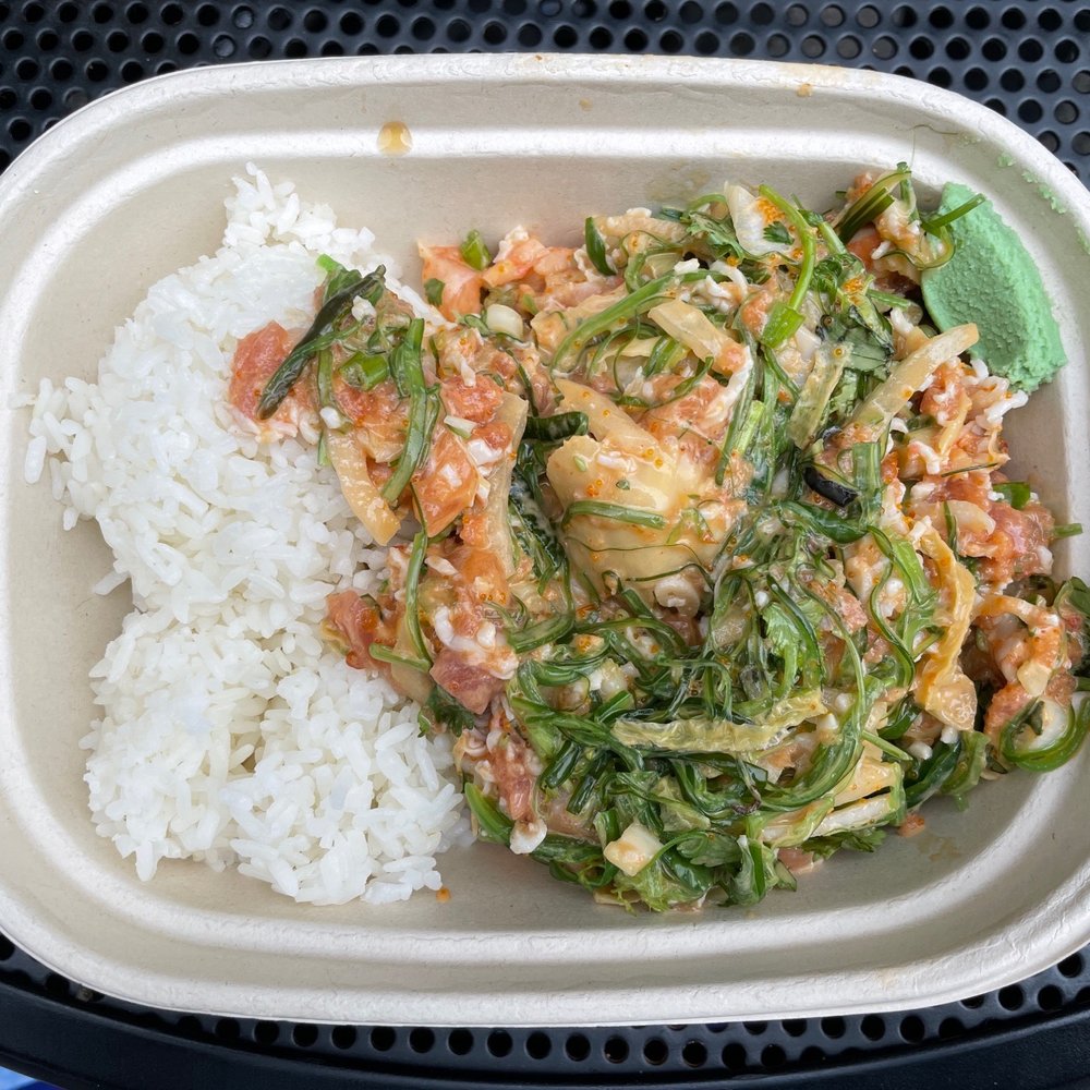 a container of rice and vegetables a container of rice and vegetables