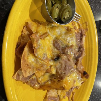 Reuben's Mexican Food - Bean and cheese nachos that had the jalapeños on the side oddly enough. - Mexican Near Me - Hilo, Hawaii Reuben's Mexican Food - Bean and cheese nachos that had the jalapeños on the side oddly enough. - Mexican Near Me - Hilo, Hawaii