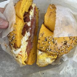 Bagel & Bakery - bacon & egg on Everything bagel with onion and tomato
