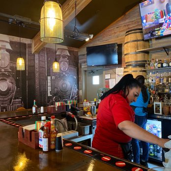 The Mexican Bar & Grill - a woman working behind the bar - Mexican Near Me - Minturn, Colorado The Mexican Bar & Grill - a woman working behind the bar - Mexican Near Me - Minturn, Colorado