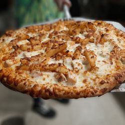 La Famiglia Gourmet Pizza - Charlie's Favorite - buffalo chicken, fries, and cheese.  What's not to love?