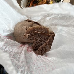 Abyssinia Ethiopian Restaurant And Bar - Gluten free side order of Injera not sanitary, came in a plastic bag