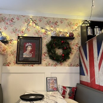 Robinsons Tea Room - a table with a flag on it - Desserts Near Me - Stony Brook, New York