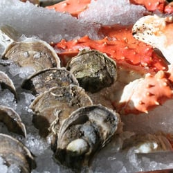 The Oysters come from the Naked Oyster Seafarm in Barnstable Harbor.