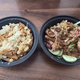 Feta fries and Chicken Shawarma bowl with feta and olives.