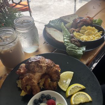 Sunny Eggs - Croissant sandwich with egg, bacon, and cheese. Vanilla iced latte . - Juice Bars & Smoothies Near Me - Key West, Florida Sunny Eggs - Croissant sandwich with egg, bacon, and cheese. Vanilla iced latte . - Juice Bars & Smoothies Near Me - Key West, Florida